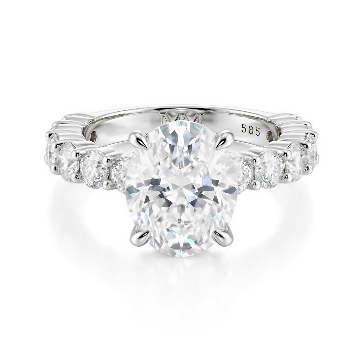 Majestica - Ring med oval moissanit och sidostenar